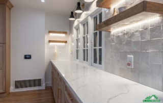 Best Under Cabinet Lighting. Image of a kitchen with lights under the shelves and cabinets.